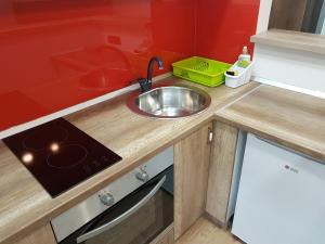 Η κουζίνα ή μικρή κουζίνα στο Apartman Simić 2