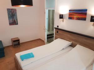 Ένα ή περισσότερα κρεβάτια σε δωμάτιο στο Apartman Simić 2