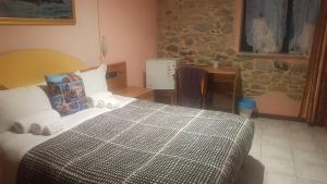 Posteľ alebo postele v izbe v ubytovaní Locanda Dalla Compagnia