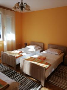 Postel nebo postele na pokoji v ubytování Apartment Singa