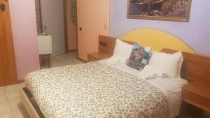 Posteľ alebo postele v izbe v ubytovaní Locanda Dalla Compagnia