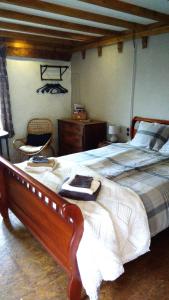 سرير أو أسرّة في غرفة في Grootgenoegen