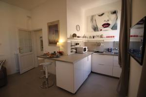 Kuchnia lub aneks kuchenny w obiekcie Klee House Trastevere