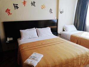Letto o letti in una camera di Hostal Capri