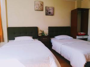 Letto o letti in una camera di Hostal Capri