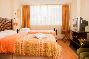 Letto o letti in una camera di Hostal Capri