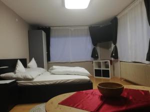 Łóżko lub łóżka w pokoju w obiekcie Apart Family Schweng