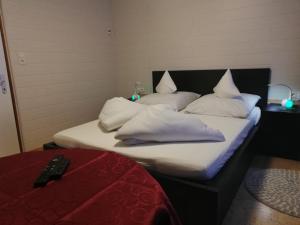 Łóżko lub łóżka w pokoju w obiekcie Apart Family Schweng