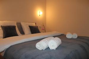 Voodi või voodid majutusasutuse Rooms 3 toas