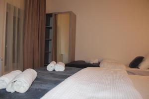 Voodi või voodid majutusasutuse Rooms 3 toas