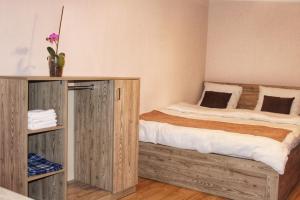 Llit o llits en una habitació de Rooms 3
