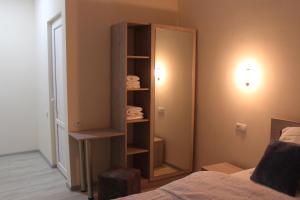 Voodi või voodid majutusasutuse Rooms 3 toas