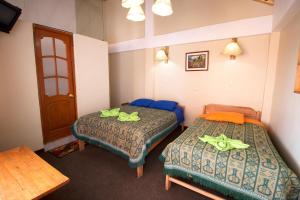 Katil atau katil-katil dalam bilik di Wake Up Cusco