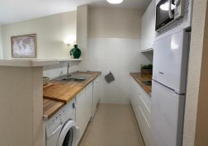 Kuchnia lub aneks kuchenny w obiekcie APARTAMENTO MARIPOSA II