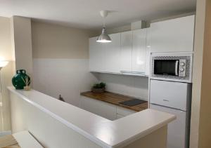 Kuchnia lub aneks kuchenny w obiekcie APARTAMENTO MARIPOSA II