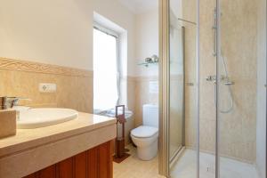 Łazienka w obiekcie Arcos Gardens Sol Rent Golf
