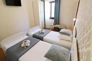 Posteľ alebo postele v izbe v ubytovaní Villa Šolo + 37 fotografií