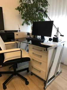 TV a/nebo společenská místnost v ubytování Apartment Friedrich 1201 + 2 fotografie