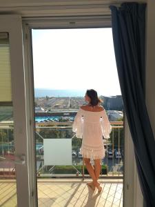 A balcony or terrace at Le Murrine Frontemare Apartment Seaview