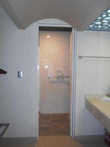 Koupelna v ubytování Hotel Puente Real