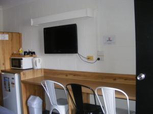 Kuchyň nebo kuchyňský kout v ubytování Motel Lodge