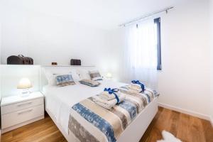Posteľ alebo postele v izbe v ubytovaní Dubrovnik oasis