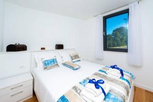 Posteľ alebo postele v izbe v ubytovaní Dubrovnik oasis