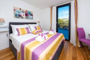 Posteľ alebo postele v izbe v ubytovaní Dubrovnik oasis