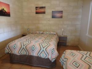 Postel nebo postele na pokoji v ubytování Lazy Lobster Holiday Units & Chalets