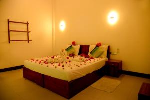 Letto o letti in una camera di Green View Resort - Anuradhapura