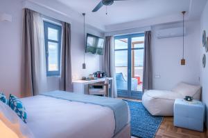 Posteľ alebo postele v izbe v ubytovaní Shapes Luxury Suites