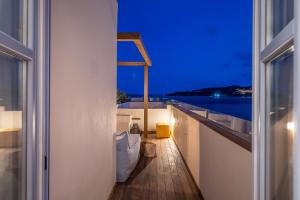 Fotografia z galérie ubytovania Shapes Luxury Suites v destinácii Ermoupoli