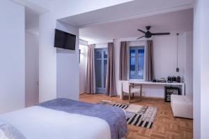 Posteľ alebo postele v izbe v ubytovaní Shapes Luxury Suites