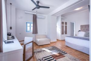 Posteľ alebo postele v izbe v ubytovaní Shapes Luxury Suites