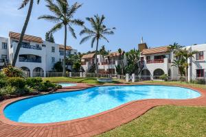 Swimmingpoolen hos eller tæt på Le Paradis, Self-Catering Beachfront Apartments
