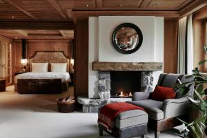 Letto o letti in una camera di The Alpina Gstaad