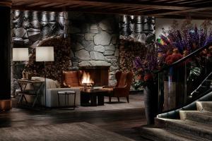 Area soggiorno di The Alpina Gstaad