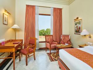 The Ummed Jodhpur Palace Resort & Spa客房内的一张或多张床位