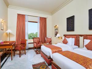 The Ummed Jodhpur Palace Resort & Spa客房内的一张或多张床位