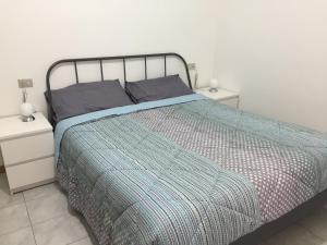 Katil atau katil-katil dalam bilik di Casa Amato b&b
