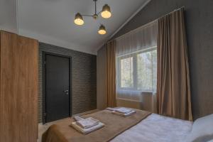 Lova arba lovos apgyvendinimo įstaigoje Villa by Sunexpress Bakuriani