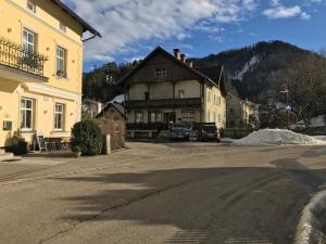 a building on the side of a street in a town at Ferienwohnung Nr.1 in Hollenstein an der Ybbs