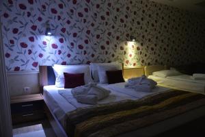 Katil atau katil-katil dalam bilik di Hotel Centar Balasevic