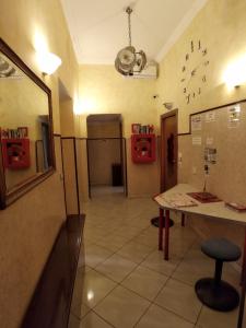 
a bathroom with a sink and a mirror at Cressy in Rome
