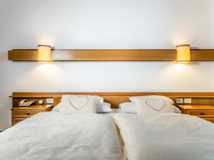 Postel nebo postele na pokoji v ubytování Hotel Pontives