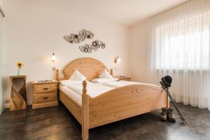 Postel nebo postele na pokoji v ubytování Pension Monika