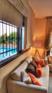 Posedenie v ubytovaní DreamView Luxury 4br Villa