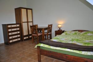 Letto o letti in una camera di Dom Bartek