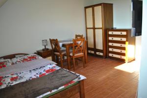 Letto o letti in una camera di Dom Bartek