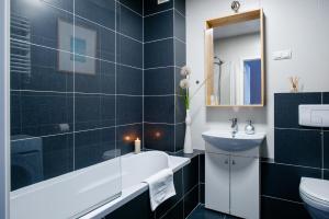 Kúpeľňa v ubytovaní Apartament Europejski + 12 fotografií